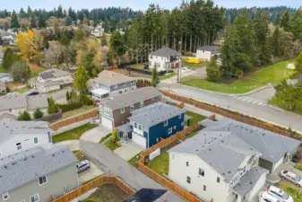 Another aerial perspective emphasizing community layout and accessibility.
