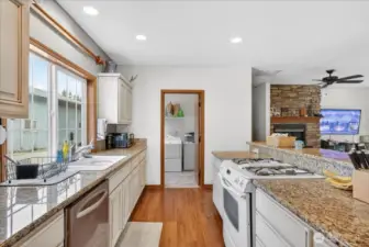 Unit A - Very spacious kitchen, open to living room & dining space. Separate utility room next to kitche with new tankless hot water heater.