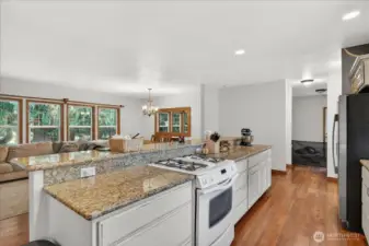 Unit A - kitchen is open to the living space! Tons of natural light.