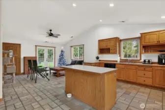 Unit B: Kitchen and living room - open floor plan. Could put stools at the kitchen island for more seating.