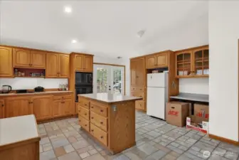 Unit B - Spacious kitche with island & lots of natural light.