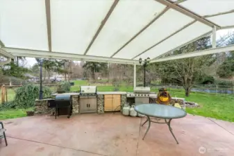 Unit B - Cover front porch with outdoor kitchen.