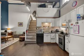 Office that is situated on the back portion of the shop with its own entrance, 3/4 bathroom, kitchenette & bonus room. This space is currently rented $1800 per month.