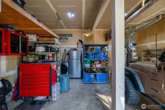 Washer and Dryer located in Garage