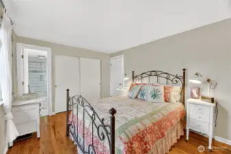 PRIMARY SUITE   Views of rear yard  Closet with double hanging rods for extra storage