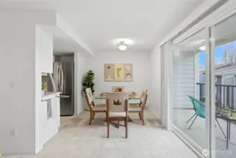 Dining area flows effortlessly from the living room, ideal for everyday living and entertaining.