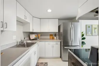 Well-designed kitchen layout ensures smooth flow and effortless connection for both everyday cooking and entertaining.