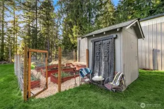 Fenced garden and well house