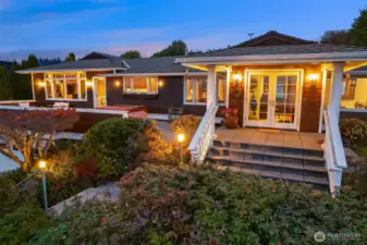 Innis Arden 1-level home brimming with charm; shingle-style architecture, multiple outdoor entertaining & play spaces, and stunning views.