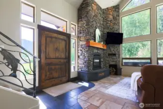 Entry with wood burning fireplace