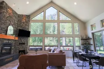 Window wall capturing stunning river and mountain side