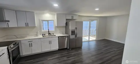 Kitchen looking North with Dining room to the right