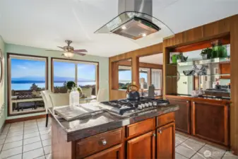 The modern kitchen features a lot of storage.