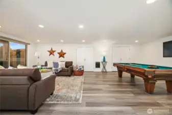 Another view of the rec room with pool table.