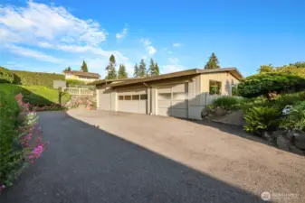 The four car detached garage. The end bay is RV height.