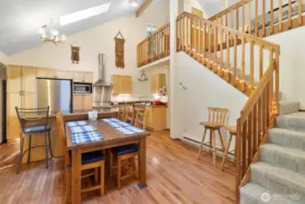 Vaulted ceilings w/ ceiling fan & stairs up to Loft / 3rd bedroom