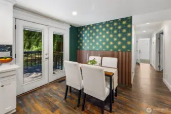 Dining room has french doors that lead directly onto the back deck