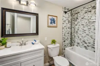Bathroom #2 - Updated with attractive new tile and vanity