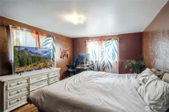 Main floor bedroom with Hardwood flooring
