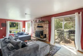 Nice window lighting in the Vamily room with access to the covered deck