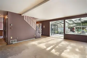 Family room opens to sun room