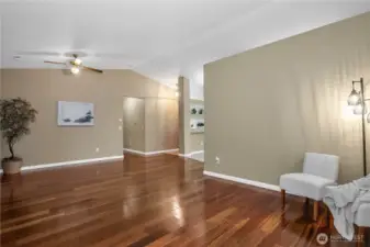 View from living room shows entryway for hall down to the bedrooms