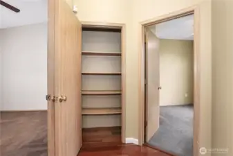 At the end of the hall is a linen closet and 2nd bedroom on the right and primary bedroom on the left