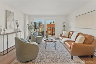 Welcome Home to this light filled space with inspiring Seattle views!