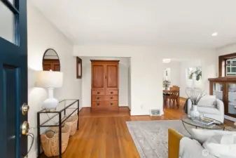 Welcome home!  Lovely original hardwood floors and open living room.