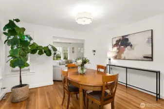 Large Formal Dining room with a bank of windows on opposite wall.