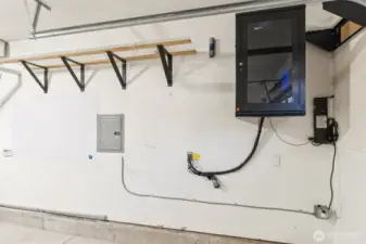 Home is wired for Ethernet LAN to support wireless acess point placement and PoE security cameras, with a centralized AV equipment bay for streamlined networking and media management, plus automated solar lighting in the backyard