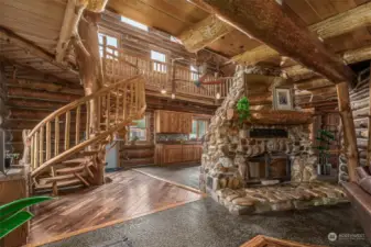 Fireplace in center of home, hand made spiral staircase to open upstairs