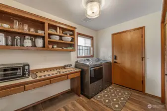 Laundry room with extra storage space. Client is using it as a butler’s pantry.