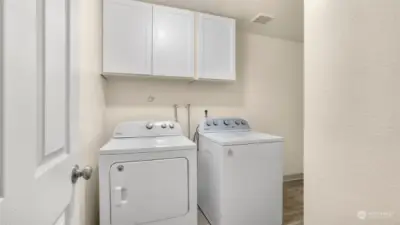 Large utility room with storage & appliances stay!