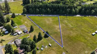 Drill a well, install a septic, and bring power onsite before building the home of your dreams! Blue boundary lines are approximate. Buyer to verify to their own satisfaction.