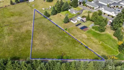 Level and dry. Partially fenced. Blue boundary lines are approximate. Buyer to verify to their own satisfaction.