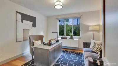 Stylish home office or 5th bedroom on the main floor.