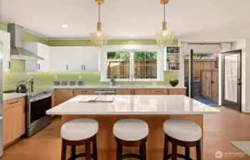 But with functionality and socialization in mind. Eco friendly with induction range and cooktop. Bosch stainless steel appliances and useful counter and storage spaces abound. Generous pantry for all your supplies....