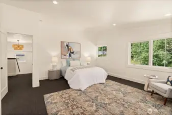 Generously designed space offers an option to furnish it with a reading area for private space. Large walk-in closet area rounds out the primary suite....