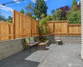 Combining hardscape and landscape surfaces ties in all spaces.