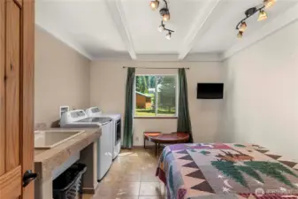 Laundry room and additional sleeping area