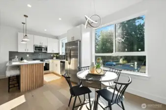 Dining area and Kitchen with Hardwoods