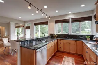 Granite tops, prep sink and upgraded cabinetry.
