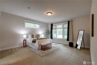 Spacious 17'x15' primary suite with 2 wired speakers.