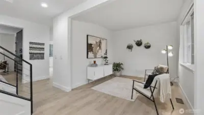 Open and airy front living space with modern finishes.