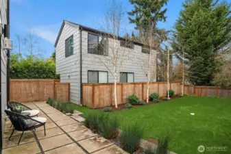 Rare fully-fenced flat backyard