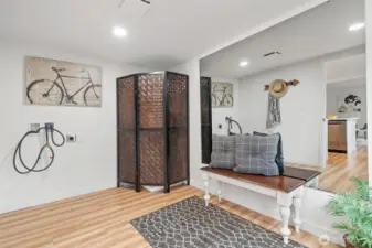 Utility/Mudroom. Hook-ups for washer and dryer. HW heater is behind the screen.