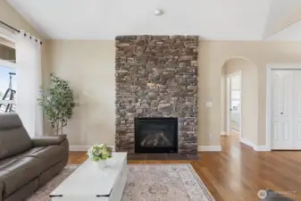 Floor to ceiling stone fireplace