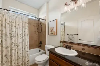 Full bathroom between the two rooms