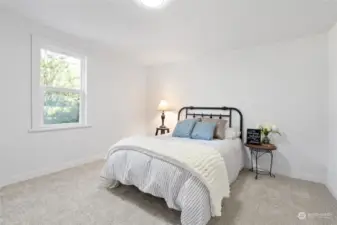 Primary bedroom with NEW paint and NEW carpet.